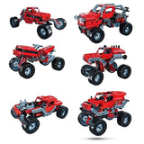 Six red construction vehicle models with different body shapes, frames and wheel arrangements.