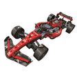 Completed Science Museum Mechanics Ultimate Racer with red body panels, black wings and printed racing details.