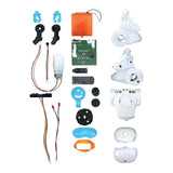 Unassembled Mio robot parts with wires, a circuit board and white, grey, blue and orange pieces.
