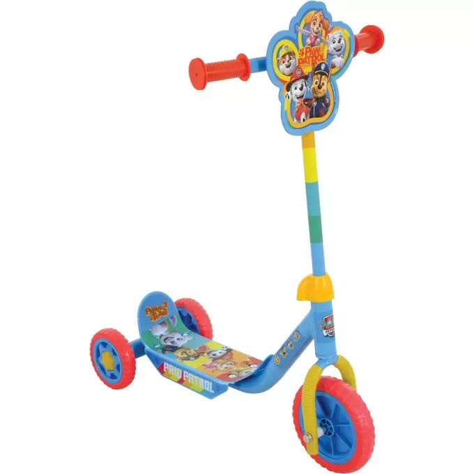 A Paw Patrol triscooter with three wheels, red grips, and a character plaque featuring Chase, Marshall, Skye, Rubble, and Everest.