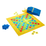 Scrabble Junior board with letter tiles, blue scoring chips and Scrabble tile bag