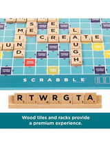 Close-up of the Scrabble board with wooden letter tiles and rack