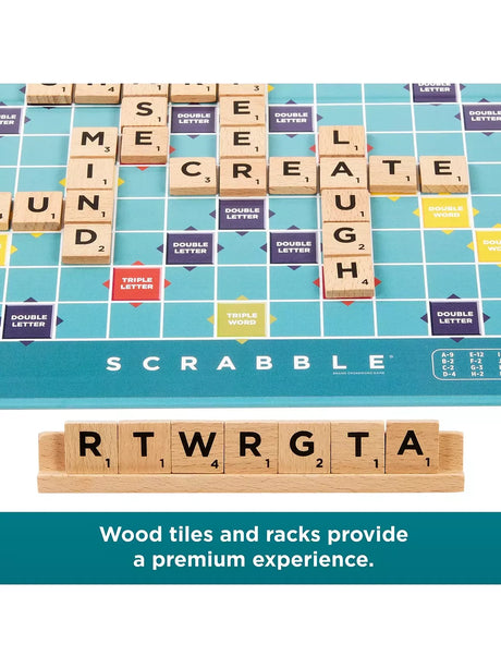 Close-up of the Scrabble board with wooden letter tiles and rack