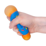 Scrunchems Donut Squishy with blue sprinkle icing and orange donut being squeezed in a hand