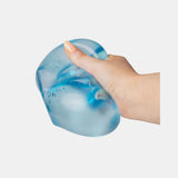 Blue Scrunchems Giant Squishy Sugar Cube being squeezed in a hand