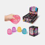 Scrunchems Squishy Sugar Drop assortment showing pink, purple, yellow and blue Sugar Drops with retail packaging