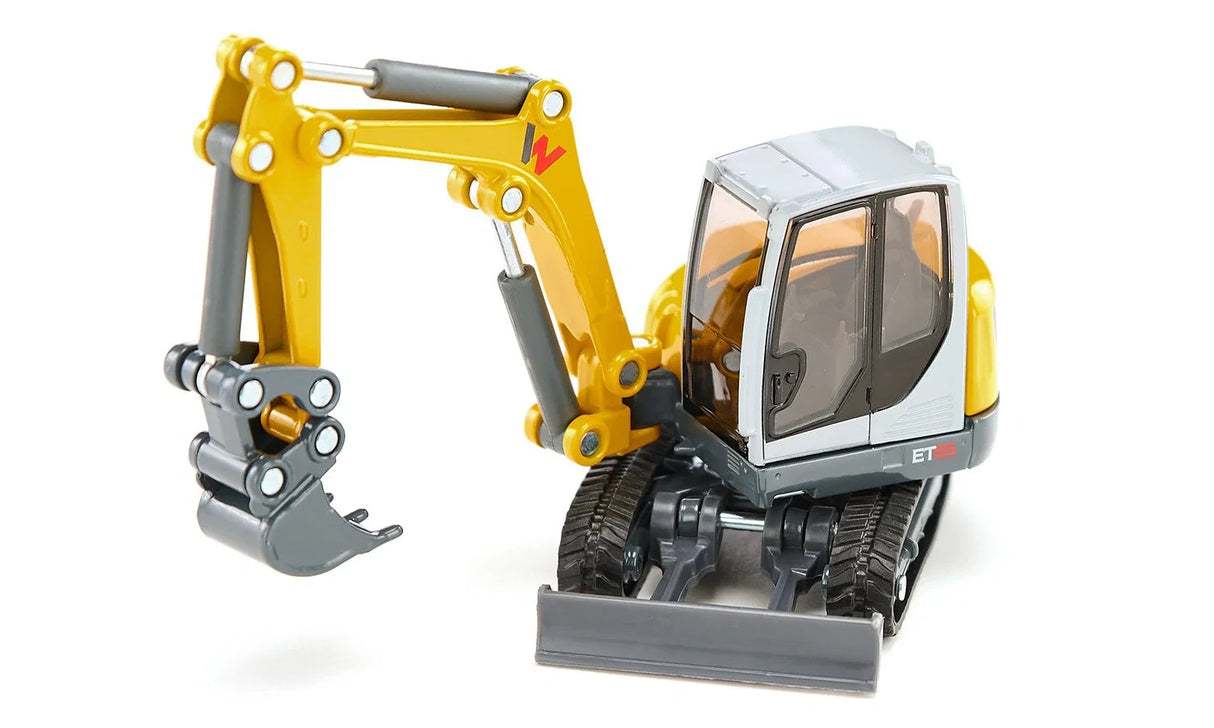 Siku Wacker Neuson ET65 Track Excavator model shown from the front with blade and bucket