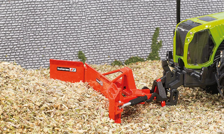 Siku 1:32 maize leveller farm toy attached to the front of a tractor in a maize scene