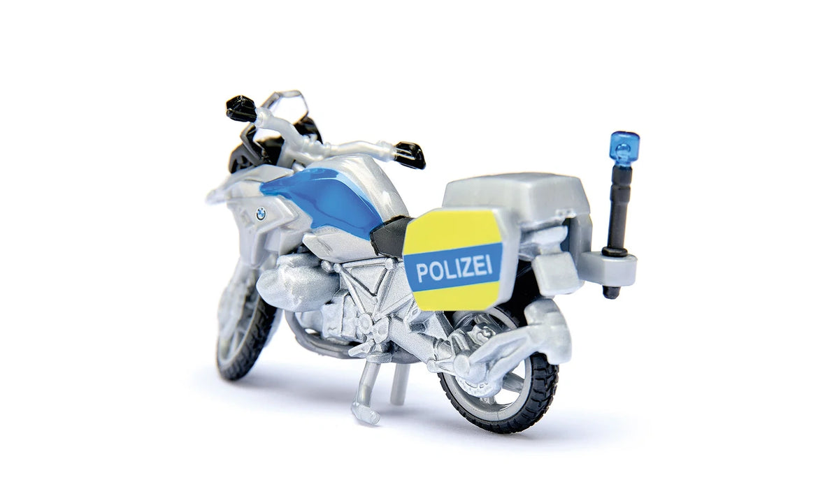 Siku BMW police motorbike from set 2562 with blue and yellow police markings, rear storage box, blue beacon and side stand