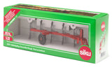 Siku full reversible plough 1:32 displayed inside green Siku Farmer retail packaging with model number 2070 visible