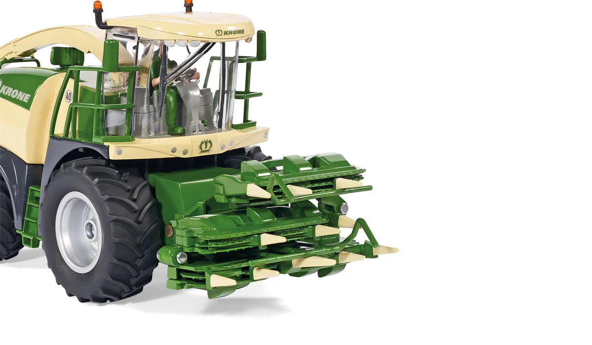 Front view of the Siku Krone BiG X 580 Forage Harvester 4066 with the maize header folded into its narrow transport position