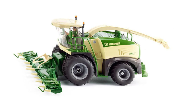 Side angled view of the Siku Krone BiG X 580 Forage Harvester 4066 showing the green and cream bodywork, cab, maize header and discharge spout