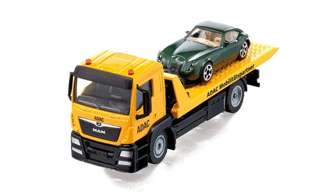 Front angled view of the Siku MAN ADAC Breakdown Truck 2722 with the green car loaded on the yellow recovery bed