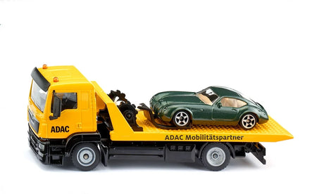 Siku MAN ADAC Breakdown Truck 2722 in side view carrying the included green car on the yellow recovery platform