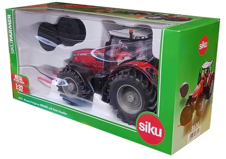 Boxed Siku 1:32 Massey Ferguson 8680 farm toy tractor with bale handler and bales