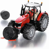 Siku Massey Ferguson 8680 farm toy tractor with bale handler carrying a bale and a second bale beside it