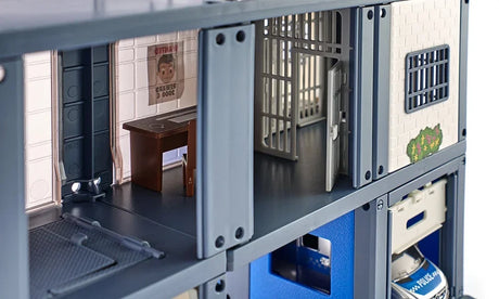 Siku Police Station 5510 cell block interior showing barred cells, bench and wall details