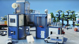 Siku Police Station 5510 in a SIKUWORLD street scene with police vehicles, modular station buildings and road layout