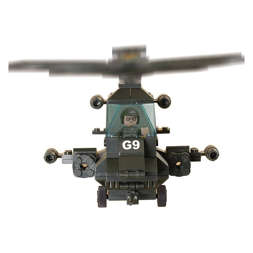 Sluban Apachi Battle Plan helicopter shown from the front with pilot visible through the cockpit, spinning main rotor, front landing wheels and side mounted weapon pods