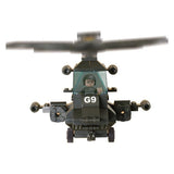 Sluban Apachi Battle Plan helicopter shown from the front with pilot visible through the cockpit, spinning main rotor, front landing wheels and side mounted weapon pods