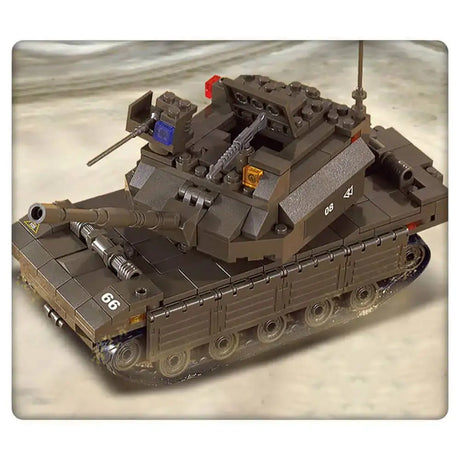 Close view of the Sluban Fields Battle Forces dark green tracked tank with long main gun, rotating turret, mounted weapons, antenna and side track detail