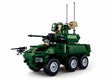 Sluban MB-EBRC 6x6 Wheeled Infantry Combat Vehicle shown from the front side with angular green bodywork, six wheels, turret cannon, upper weapon details, two soldier figures and separate mounted machine gun