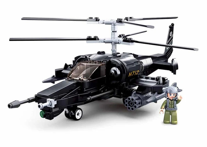 Sluban Model Bricks KA-50 Black Shark helicopter shown from the front side with clear cockpit, twin rotor assembly, nose gun, side mounted rocket pods, landing gear and pilot figure