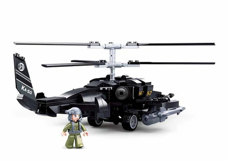Sluban Model Bricks KA-50 Black Shark helicopter shown from the front side with clear cockpit, twin rotor assembly, nose gun, side mounted rocket pods, landing gear and pilot figure
