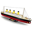 Sluban Titanic 1:350 angled view showing the completed ship with four yellow funnels, masts, rigging and display stand