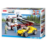 Sluban Town M38-B0879 box front showing the flatbed tow truck, yellow sports car, three figures, 338 piece count and 6 to 10 age marking