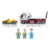 Sluban Town Car Trailer size graphic showing the yellow sports car at 11.1 cm long, the flatbed tow truck at 20.7 cm long and three included figures below