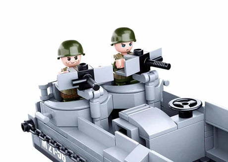 Close view of the Sluban WWII Higgins Landing Craft rear section showing two soldier figures at the mounted gun positions and the steering wheel inside the boat