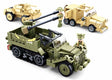 Sluban WWII Set showing the green tracked military vehicle with twin rear guns and rotating mount, with tan wheeled military vehicles and a soldier figure shown behind it