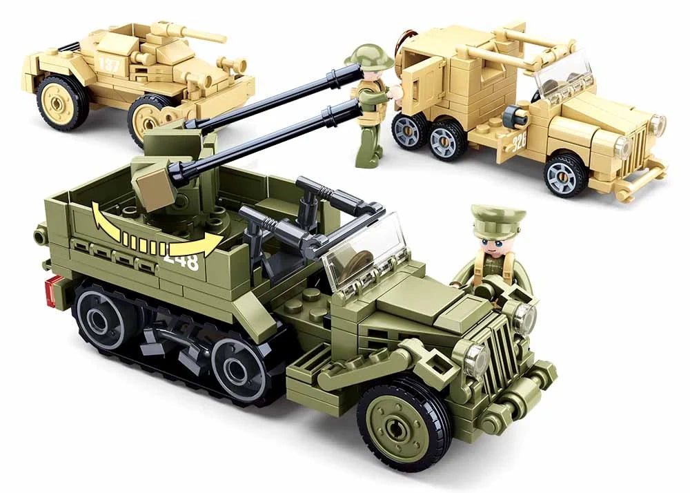 Sluban WWII Set showing the green tracked military vehicle with twin rear guns and rotating mount, with tan wheeled military vehicles and a soldier figure shown behind it