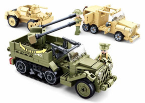 Sluban WWII Set showing the green tracked military vehicle with twin rear guns and rotating mount, with tan wheeled military vehicles and a soldier figure shown behind it