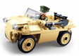 Sluban WWII VW 82 Amphibious Tub Car shown from the front with a soldier figure seated behind the windscreen, round headlights, four wheels and shovel mounted along the side