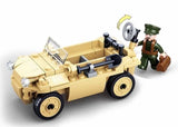 Sluban WWII VW 82 Amphibious Tub Car shown from above with the tan vehicle, side mounted shovel, open passenger area and soldier figure standing beside the raised rear propeller