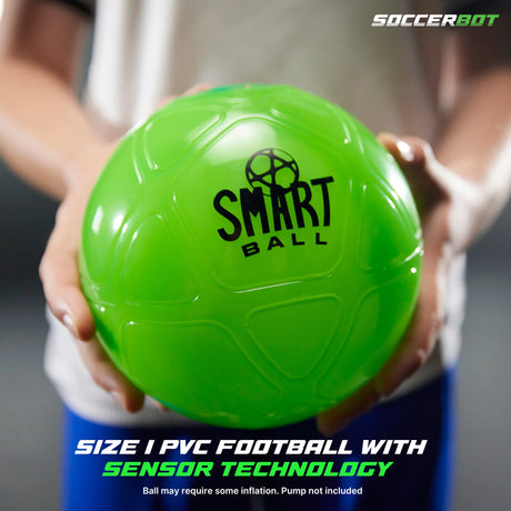 Close-up of Smart Ball green PVC football with sensor tech held in hands in Ireland