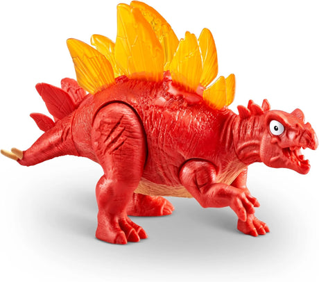 Red plastic stegosaurus dinosaur figure with yellow semi-transparent plates on back and textured body, side view on plain white background