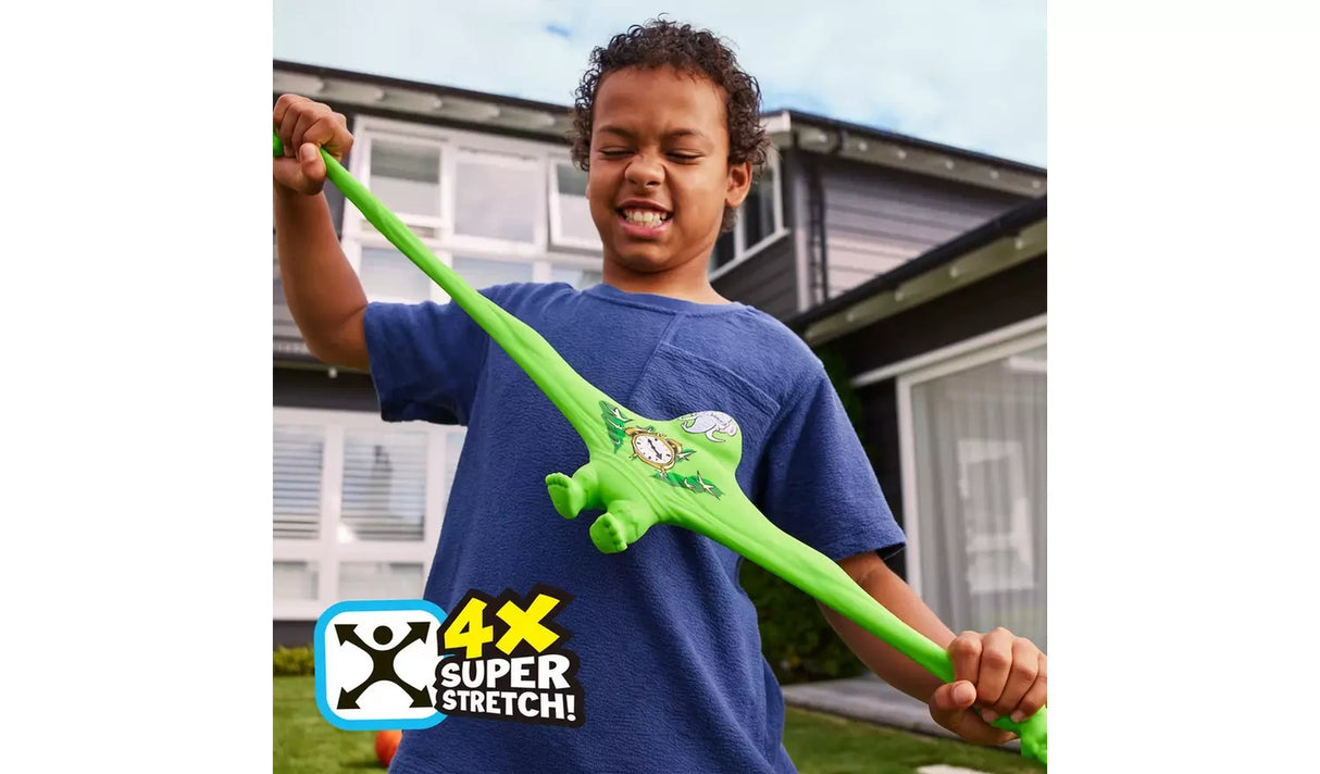 Child stretching the green Smashers Brain Rot figure horizontally between both hands
