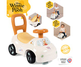Smoby Winnie the Pooh Auto Ride On product graphic showing the white car, walking and riding functions, lifting seat, 50 kg weight marking and Made in France badge.
