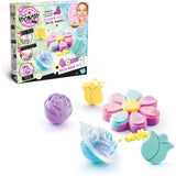 So Bomb DIY Flower Bath Bomb Kit retail packaging displayed with colourful flower-shaped bath bombs and bath bomb making accessories against a white background.