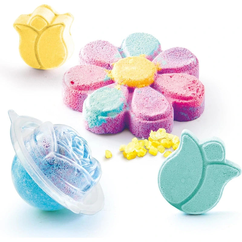 So Bomb DIY Flower Bath Bomb Kit display with colourful flower-shaped bath bombs and bath bomb making accessories arranged against a white background.