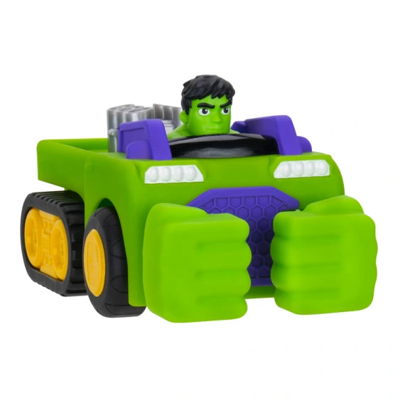 Side view of Hulk's green Smash Tank on a white background, showing the large rolling wheels, green body and punching fists at the front.