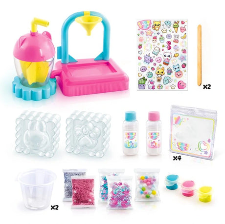 Squish Squish DIY Squishy Factory contents arranged on a white background, including the pink mixing machine, bunny and paw moulds, two gel bottles, three coloured dyes, mixing cups, wooden sticks, glitter, confetti, pom poms, printed bags and sticker sheet.