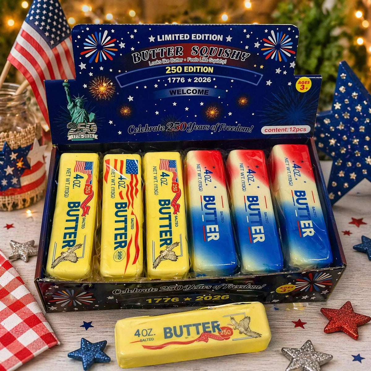 Squishy Butter USA 250 Edition retail display with American flags, yellow flag butter squishies and red white and blue butter squishies