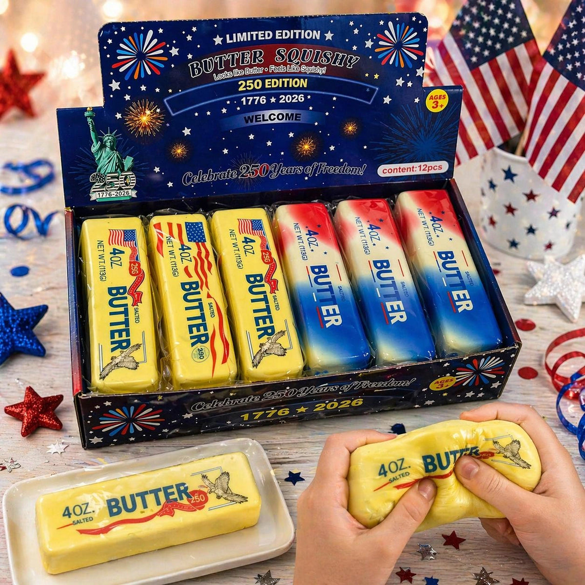 Squishy Butter USA 250 Edition retail display with yellow butter squishy being squeezed by hand