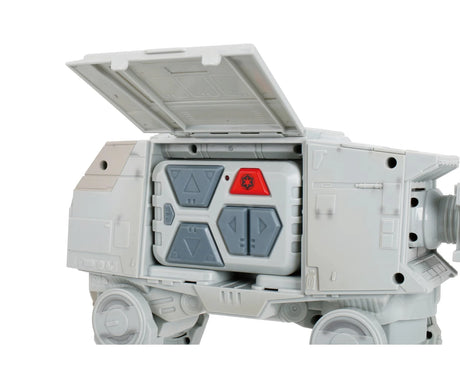 Close-up of the Star Wars RC Walking AT-AT with its upper body hatch open, revealing the grey remote controller stored inside.