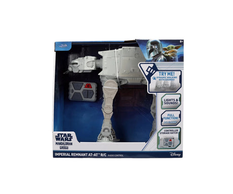 Star Wars The Mandalorian Imperial Remnant AT-AT retail packaging showing the grey walker, remote controller, Din Djarin and Grogu artwork, and lights and sounds feature labels.