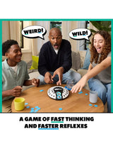 Three people playing Starts With Ends With around a table with the spinner device in the centre